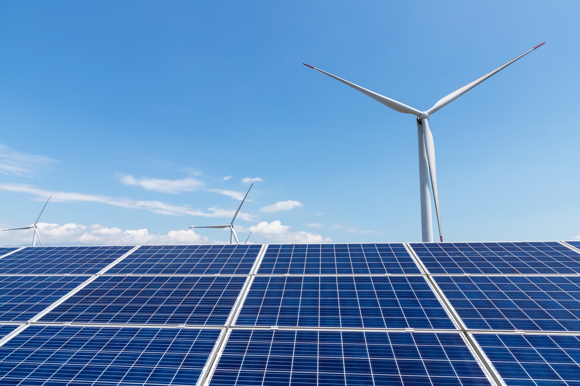 wind-power-plant-and-solar-panel-for-renewable-energy.jpg